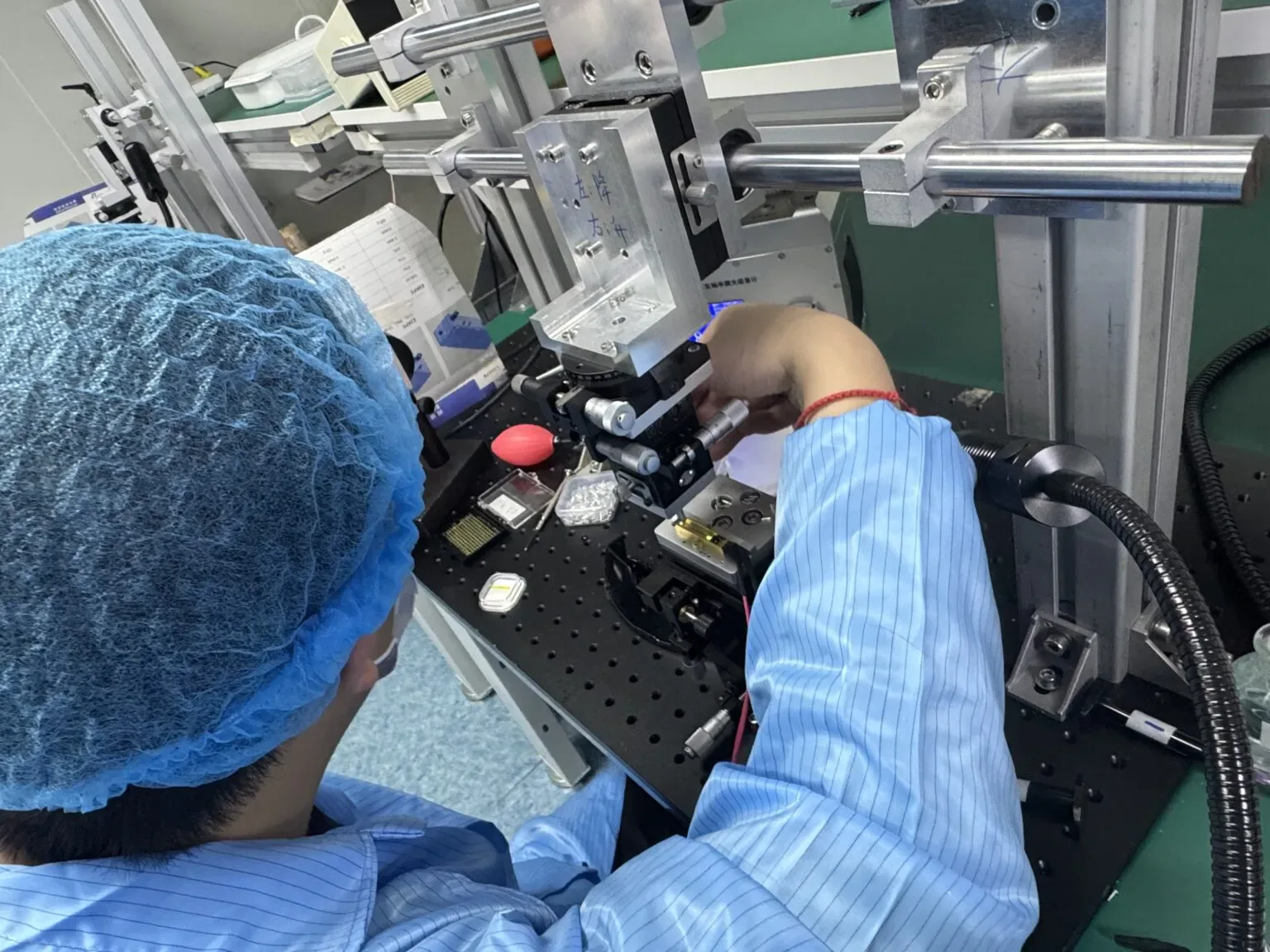 Precision optical assembly bench, module components under alignment